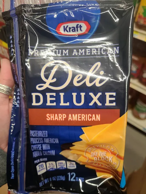 Kraft Deli Deluxe Sharp American Cheese Slices 8 oz, front of pack