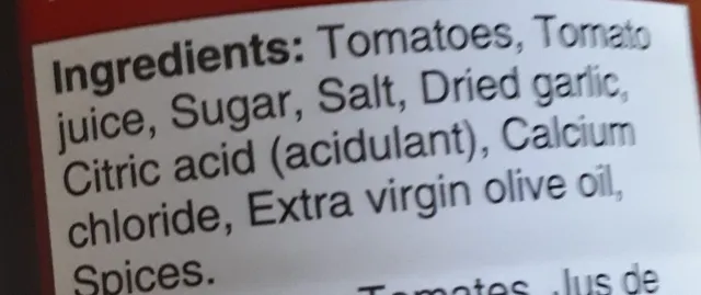 Aylmer Accents Garlic & Olive Oil Petite Cut Stewed Tomatoes 540 mL, ingredients of pack