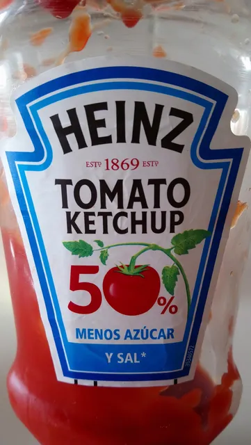 Heinz Tomato Ketchup 50% Less Sugar & Salt 500 ml, front of pack